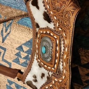 American Darling  hair on  ,buckle, shoulder strap